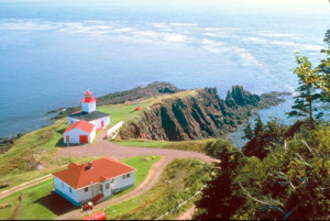 A lighthouse overlooks Cape d'Or, near Advocate Harbour, NS (courtesy Corel Professional Photos).